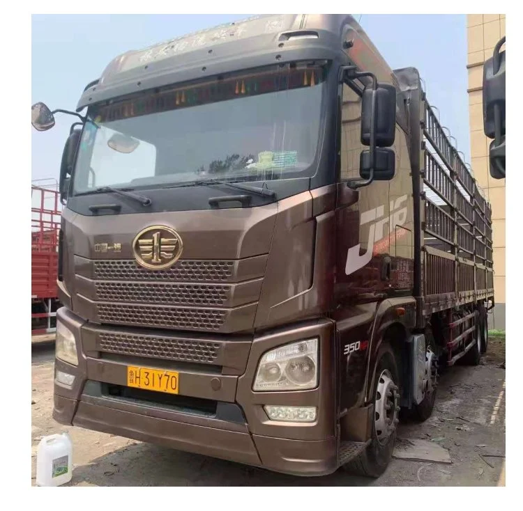 一年解放JH6前四后八高栏载货车